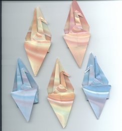 These swirl papers are nice when folded into crane placecard holders.